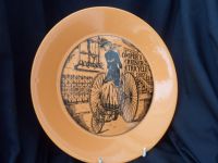 H513 Portmeirion Velocipedes - 10" Dinner Plate - Ermina Chelli of the Cirque D'ete in Orange and unmarked.