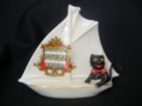 6375 Arcadian Crested China Black Cat in a Yacht - OAKEHAMPTON