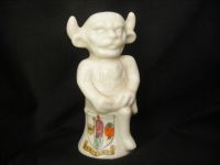 274 Unmarked Crested China Model of Lincoln Imp Sitting on Plinth, Crest is for Paisley in Scotland